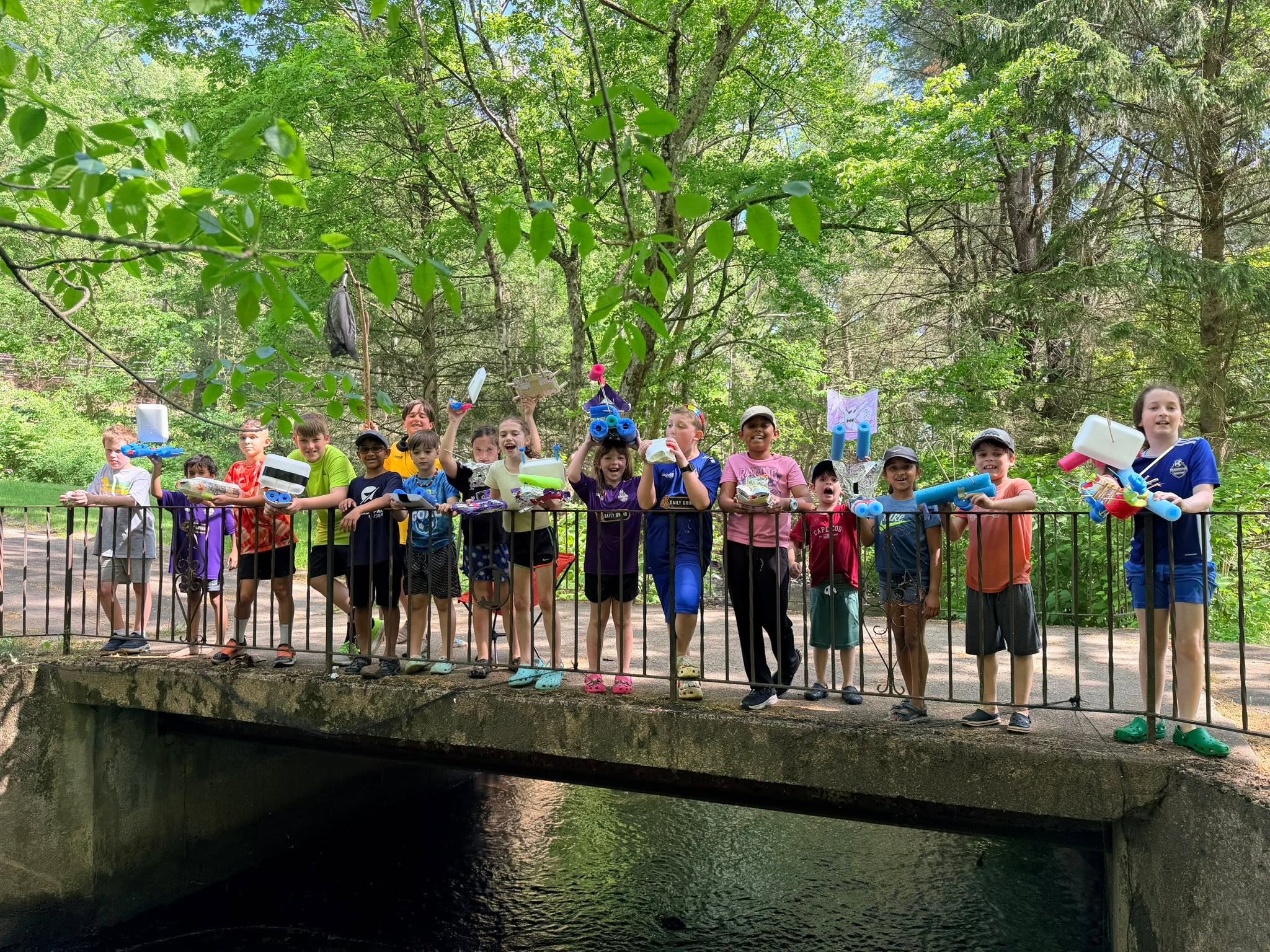 Pack gathered on bridge over water